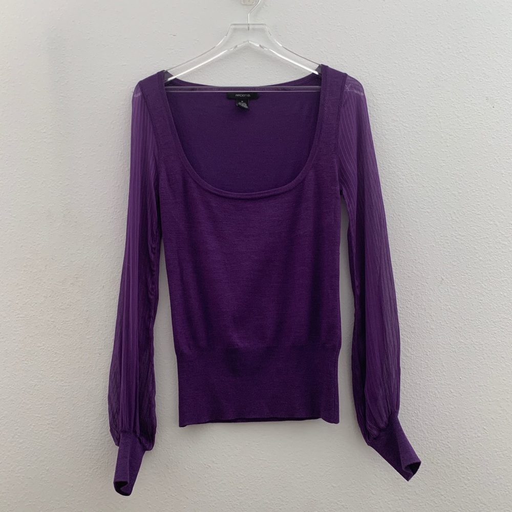 Arden B. Purple sweater with fabulous arm design.